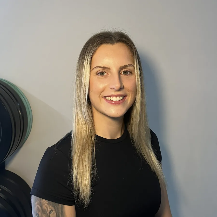 Ella, the coach behind MoveWithElls, in the studio